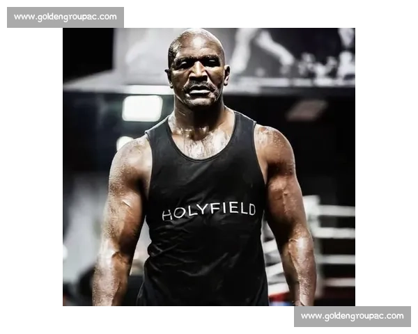 霍利菲尔德与刘易斯世纪重量级拳坛巅峰对决全景回顾传奇恩怨历史意义解析